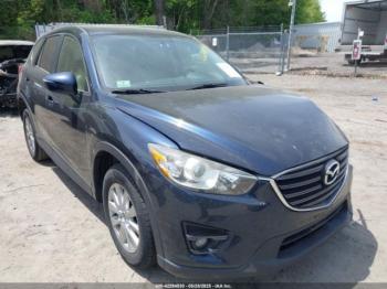  Salvage Mazda Cx