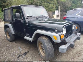  Salvage Jeep Wrangler