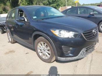  Salvage Mazda Cx